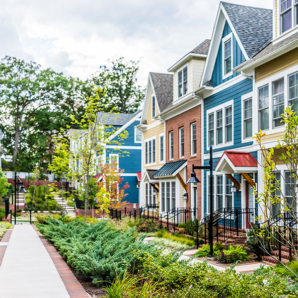 row of colorful homes in neighborhood