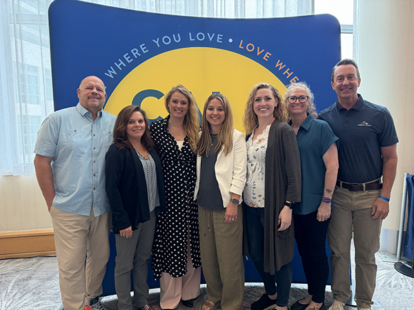 HOALiving Team Photo at CAI Annual Conference L to R: Michael Johnson, Sandy Lynn Johnson, Sarah Crawford-Spanel, Tiffany Madsen, Madelyn Mills, Kimberly Graff, and Shane Toponce
