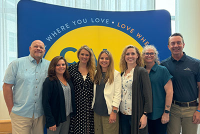 HOALiving Team Photo at CAI Annual Conference L to R: Michael Johnson, Sandy Lynn Johnson, Sarah Crawford-Spanel, Tiffany Madsen, Madelyn Mills, Kimberly Graff, and Shane Toponce